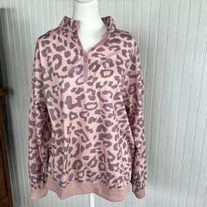 Pink and mauve half zipper mock sweat shirt.